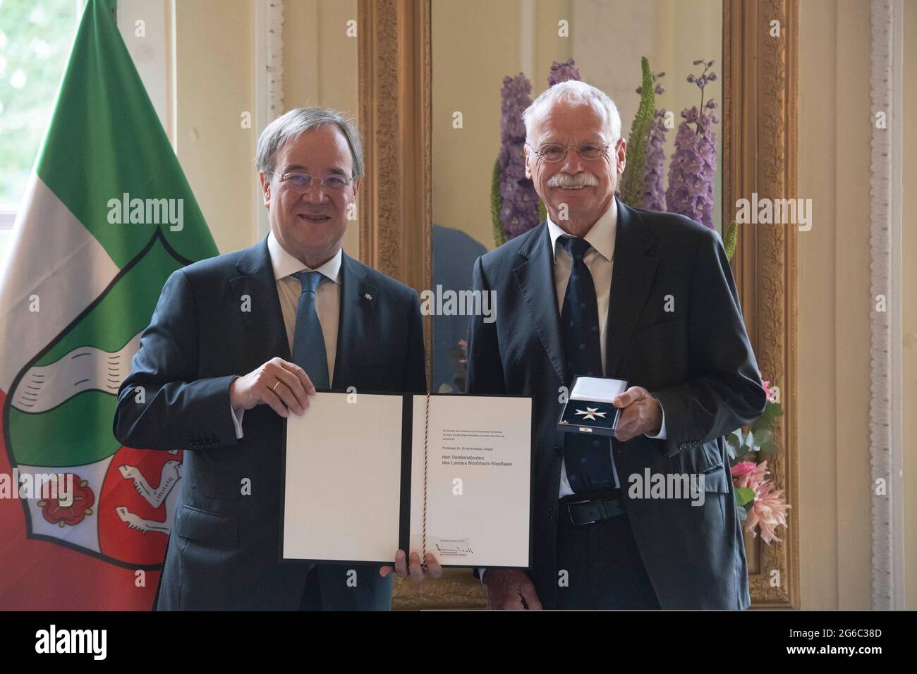 Duesseldorf, Deutschland. 28th June, 2021. Prime Minister Armin LASCHET, honors Prof. Dr. Ernst-Andreas ZIEGLER, grass roots diplomat, from Prime Minister Armin Laschet honors citizens of North Rhine-Westphalia for their exceptional commitment to society with the order of merit of the state, award of the order of merit of the state of North Rhine-Westphalia in Duesseldorf on 06/28/2021 ÃÂ Credit: dpa/Alamy Live News Stock Photo