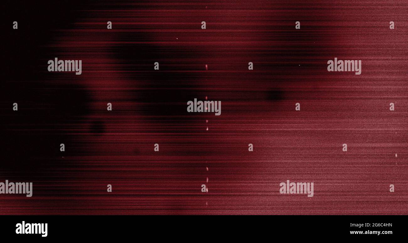 Image of multiple white specks and lines moving on seamless loop in black and red Stock Photo