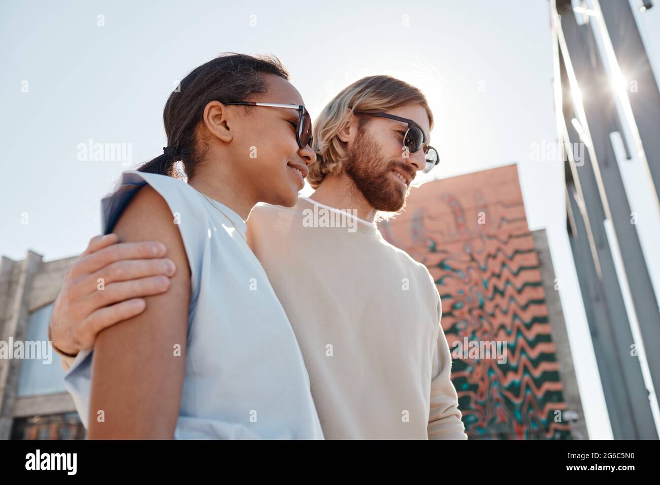 Group young people walking low angle hi-res stock photography and ...