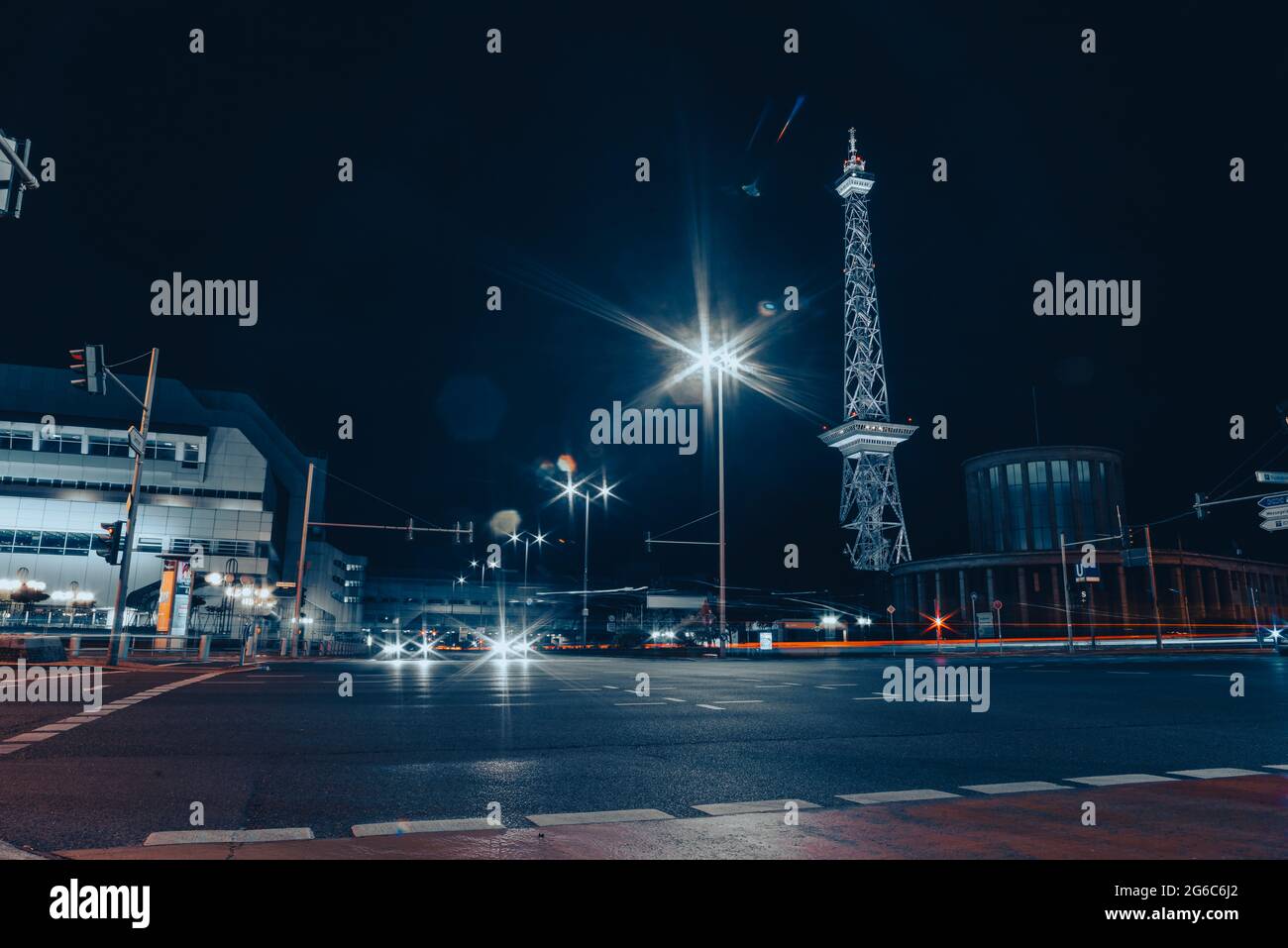 Messe Berlin, Messe Damm in Berlin Germany at night with radio tower in  Background, Crossroad at night in berlin Stock Photo - Alamy