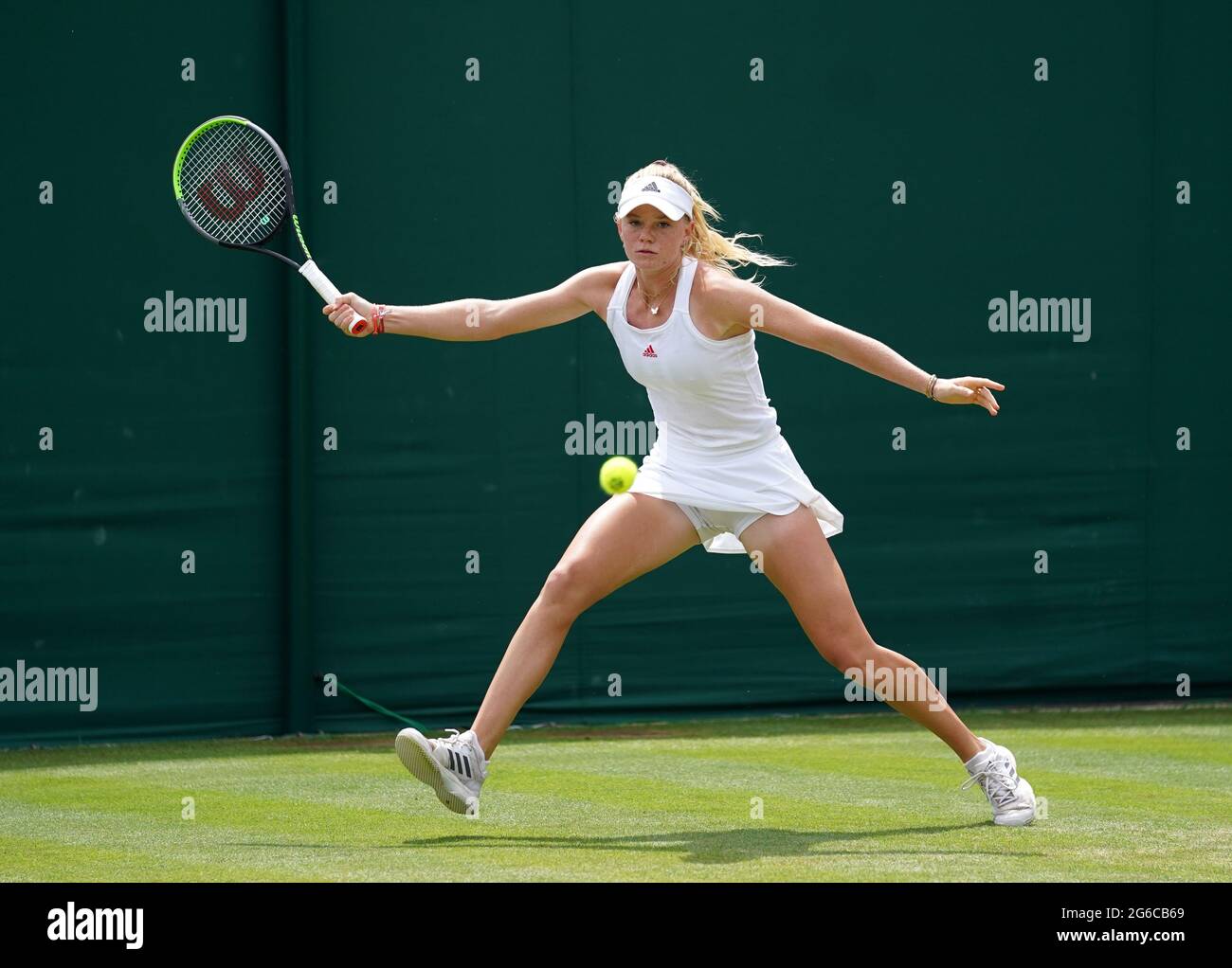 Madison Sieg in action against Ranah Stoiber in the girl's first round match on court 4 on day seven of Wimbledon at The All England Lawn Tennis and Croquet Club, Wimbledon. Picture date: Monday July 5, 2021. Stock Photo