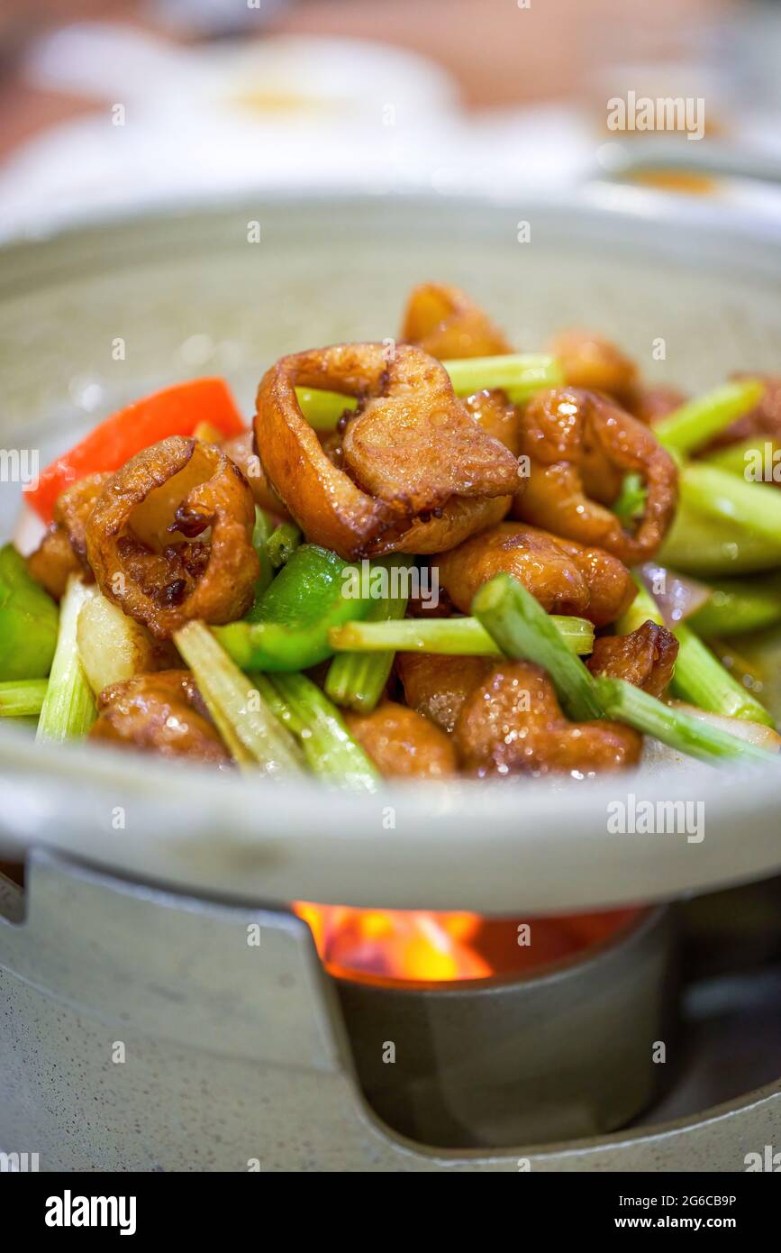 A delicious Chinese dish, fried pork intestines Stock Photo Alamy