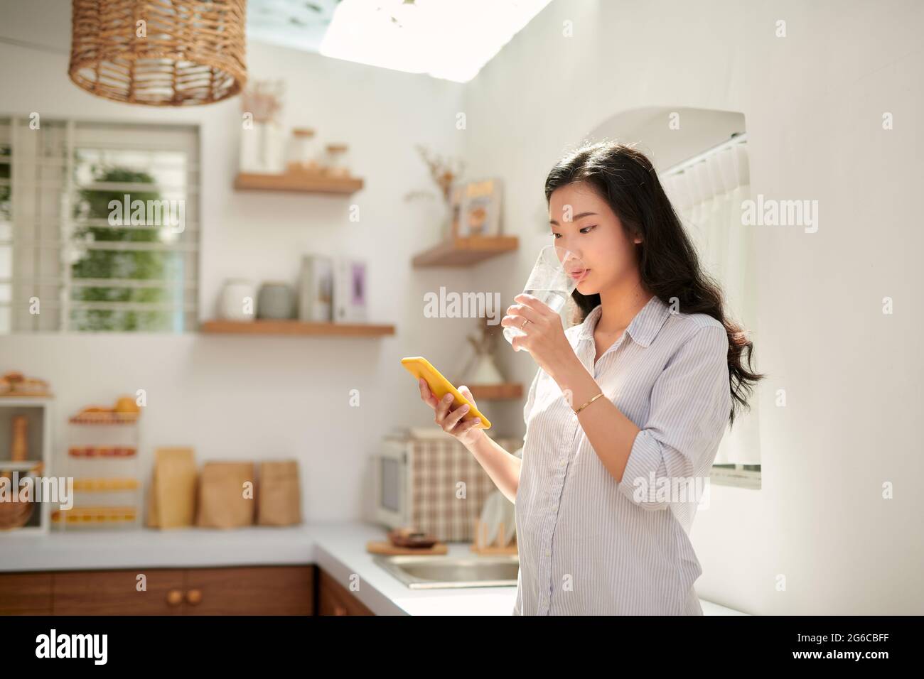 Reading phone hi-res stock photography and images - Alamy