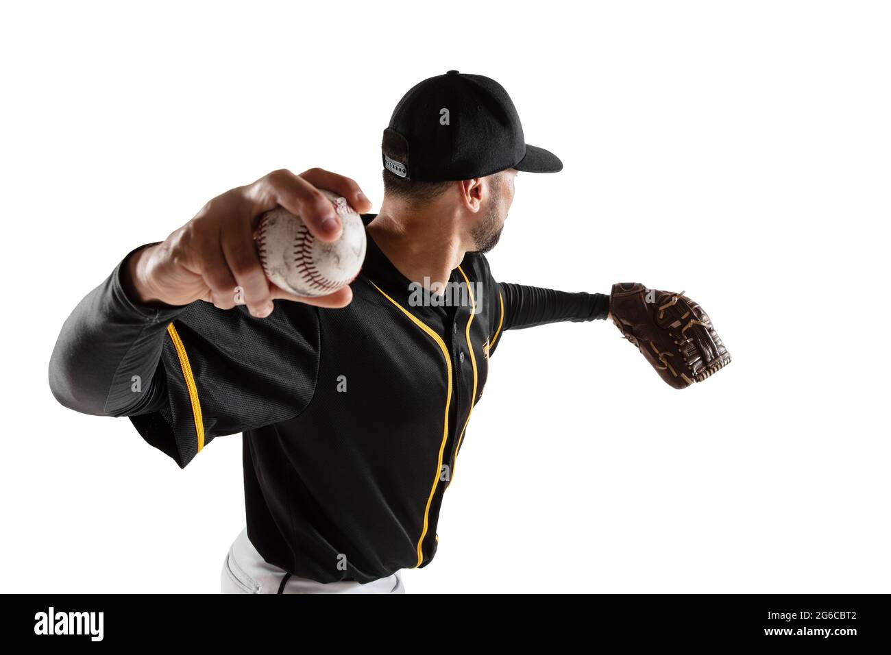 Baseball player, catcher in a black white sports uniform practicing isolated on a white studio background. Back view Stock Photo