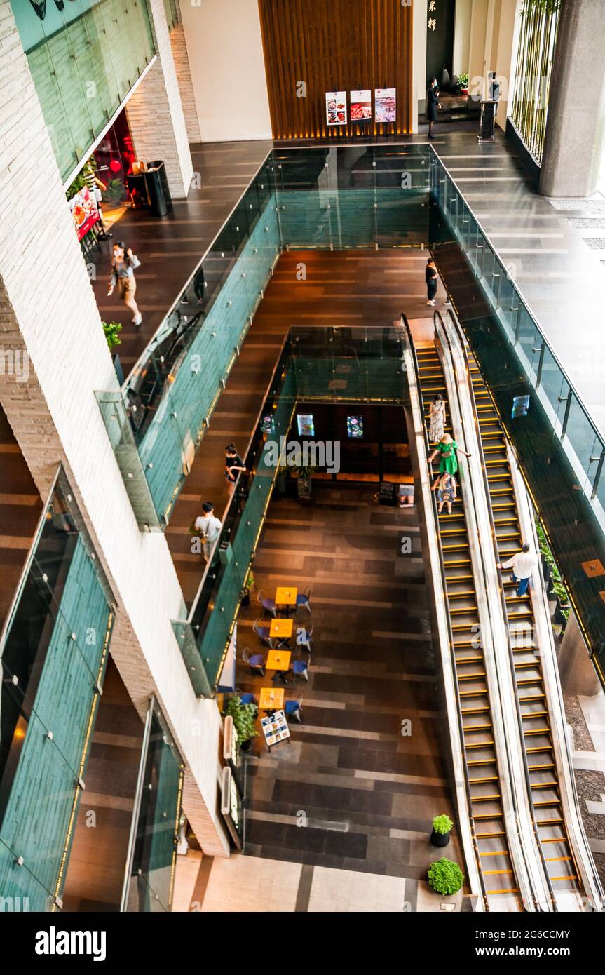The atrium with food and beverage outlets at the Reel shopping mall at Jing’an Temple, Shanghai, China. Stock Photo
