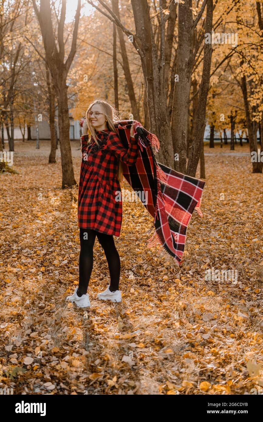 Get Ready for Fall. Prepare yourself for the Fall autumn season. No stress, reduce fall depression, positive emotions. Happy young woman enjoying life Stock Photo