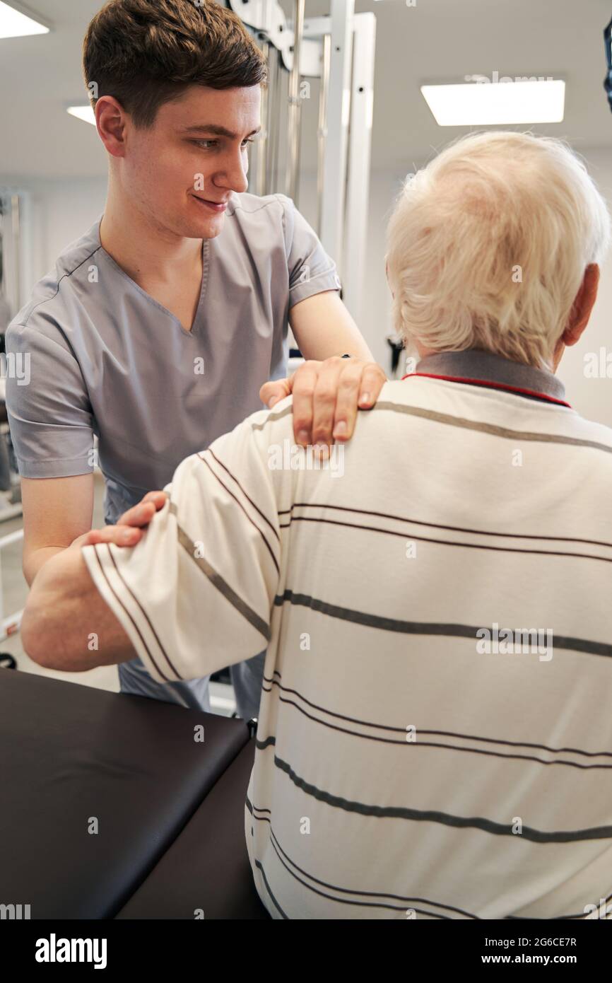 Helping patient stand hi-res stock photography and images - Alamy