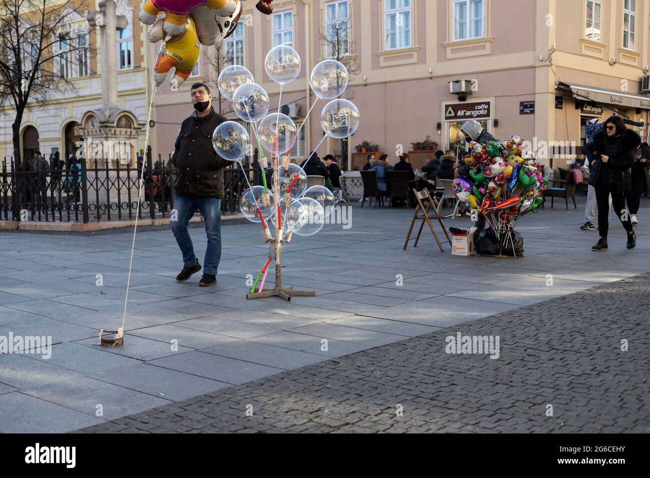 Belgrade, Serbia, Jan 1, 2021: Urban scene with balloons street sale Stock Photo
