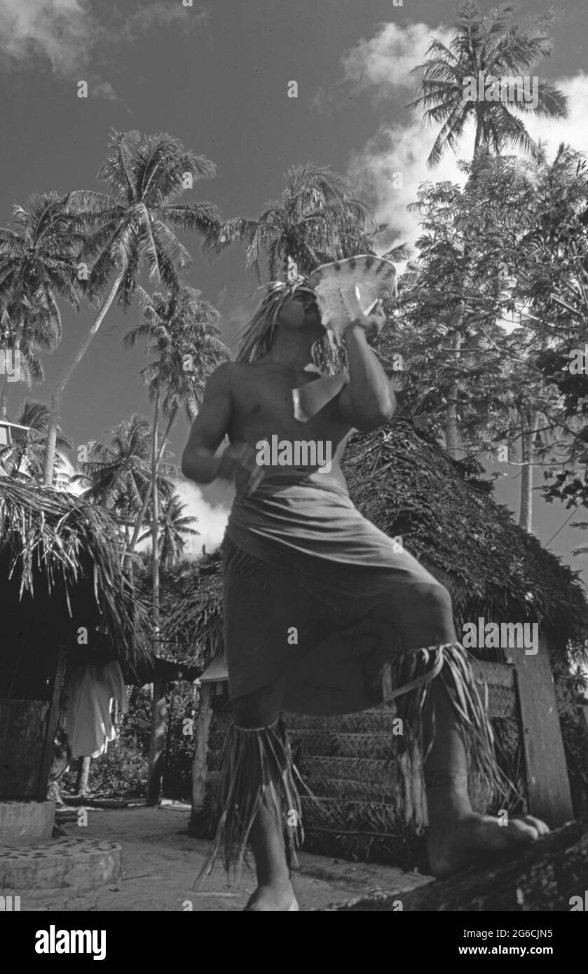 Moorea: A tribal man with a horn, often used for ceremonies Stock Photo