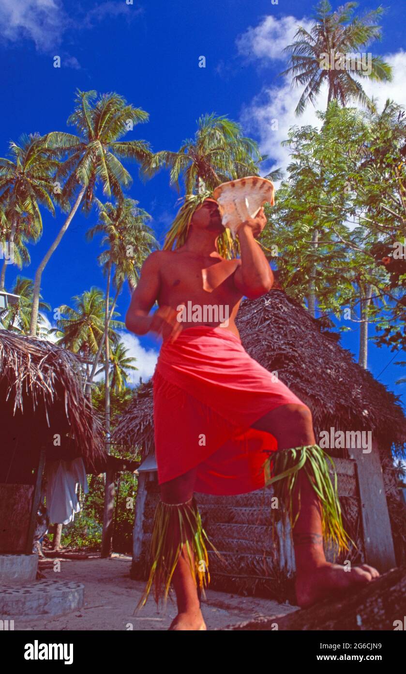 Moorea: A tribal man with a horn, often used for ceremonies Stock Photo