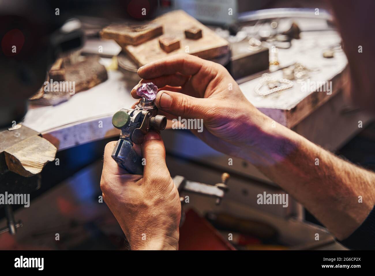 Hand holding amethyst hi-res stock photography and images - Alamy