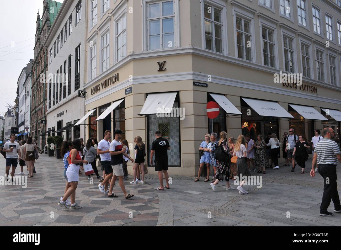 Copenhagen, Denmark.06 July 2021, Louis Vuitton shoppers waitng in line for  turn during covid-19 at social distacning in Copenhagen .Photo..Francis Jo  Stock Photo - Alamy