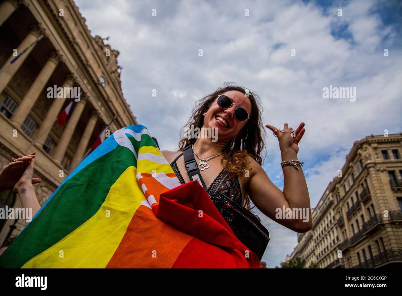 July 3, 2021, Marseille, Provence, France: Marseille, France. 03 July 2021. Partecipants holding rainbow flags attend the LGBTQ Pride march in Marseilles, in the south of France. The LGBT Pride march drew around 6,000 thousands of people to the streets of Marseille on Saturday. Marseille Pride is France's second most popular gay pride march. Gay prides, now known as LGBT Pride Marches are national events against homophobia and to support pride in being homosexual, bisexual or transexual. Gay Pride marches were cancelled in 2020 due to Covid-19 restrictions (Credit Image: © Louai Barakat/IMAGES Stock Photo