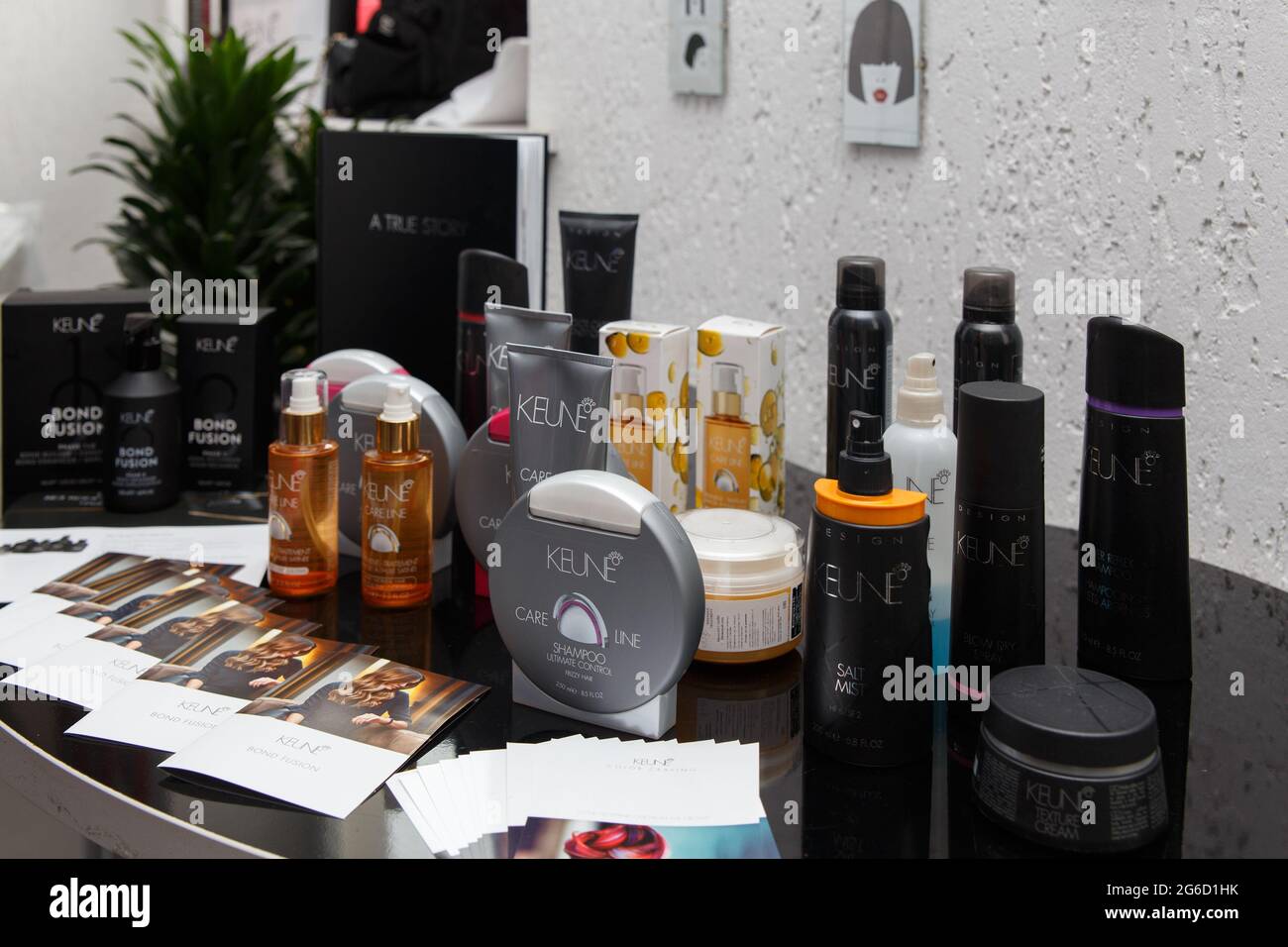 Grodno, Belarus - October 20, 2016: A table with KEUNE HAIRCOSMETICS product line. A Dutch brand of professional cosmetics for hair care. Cosmetics we Stock Photo