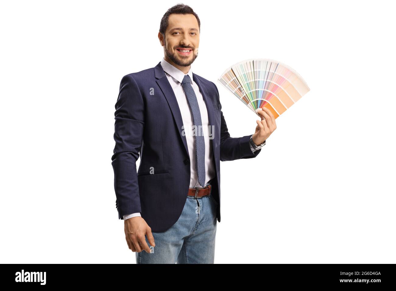Young man holding a color palette and looking at camera isolated on white background Stock Photo
