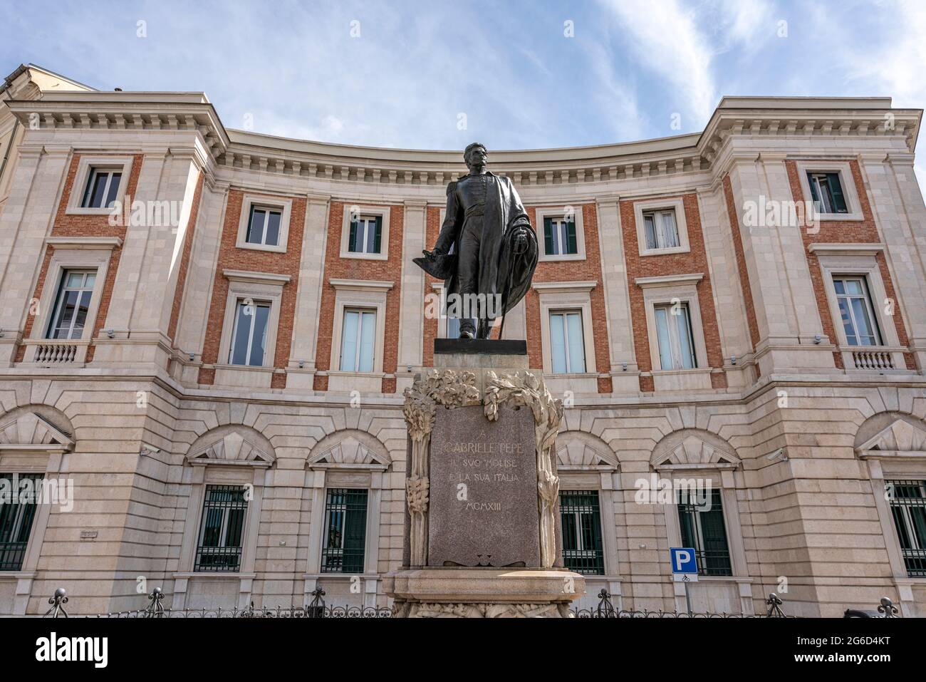Monument to Gabriele Pepe, Italian literary patriot and poet, in Campobasso. Behind the statue the headquarters of the Bank of Italy. Molise Stock Photo