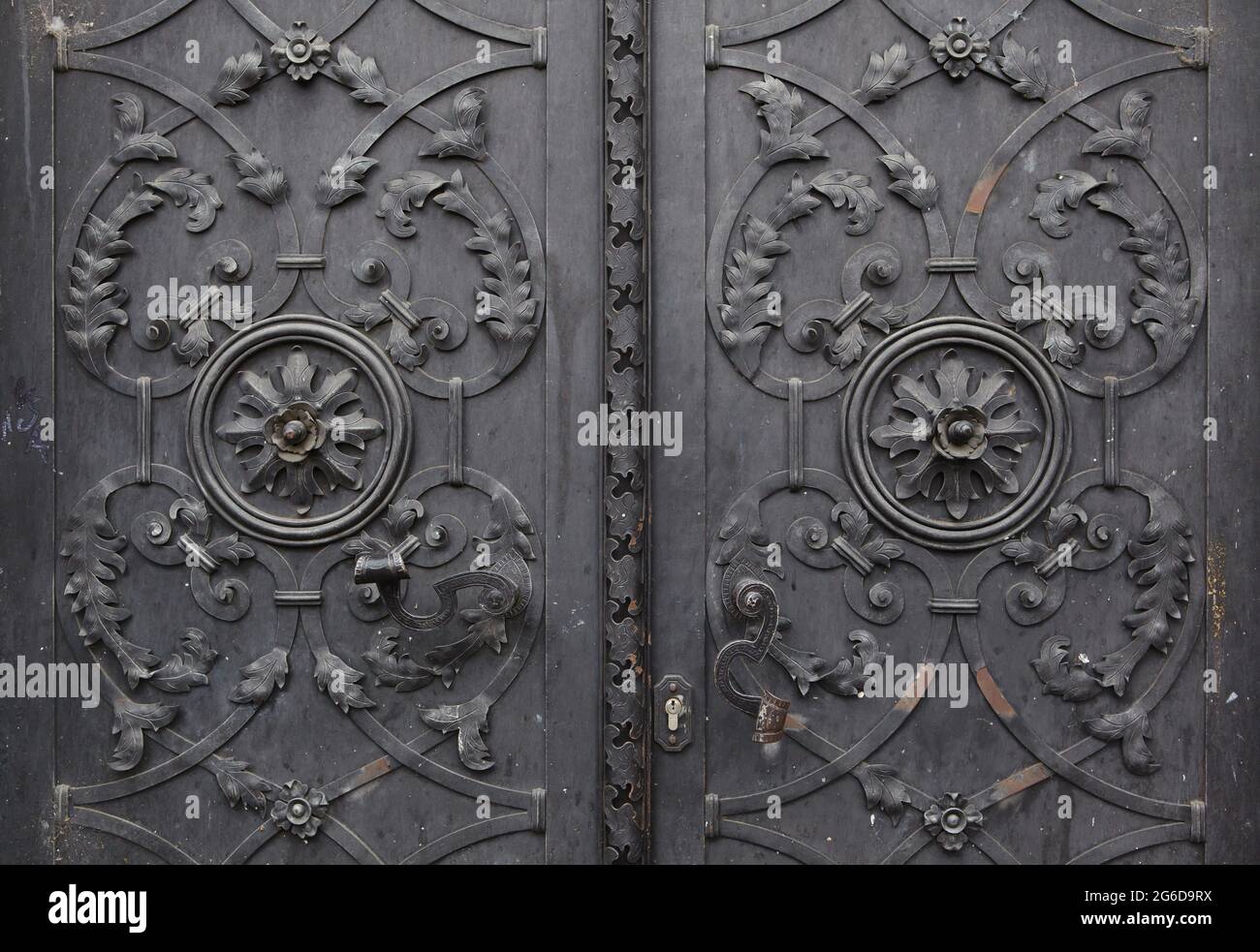 Old metal gate covered with floral patterns on the house in Uhelný Trh Square in Staré Město (Old Town) in Prague, Czech Republic. Stock Photo