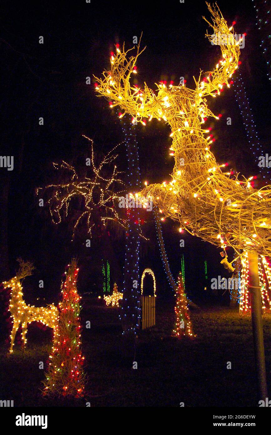 Christmas holiday lights display with flying reindeer Stock Photo Alamy