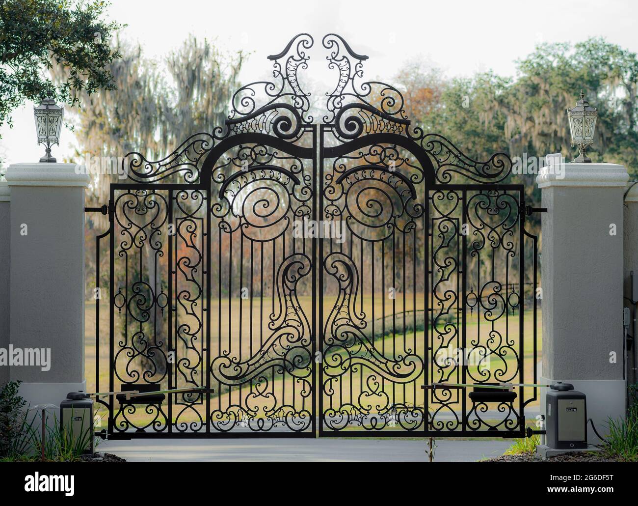 non forged aluminum decorative metalwork on estate driveway entry gates. Stock Photo