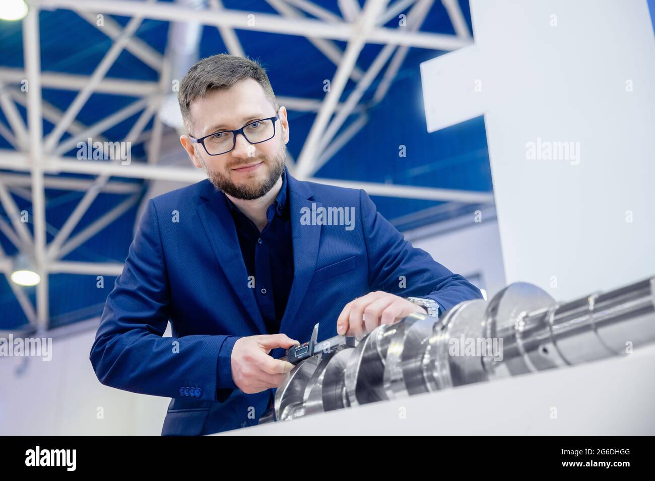 Engineering Checker Engineer checks dimensions with vernier caliper control quality of ...