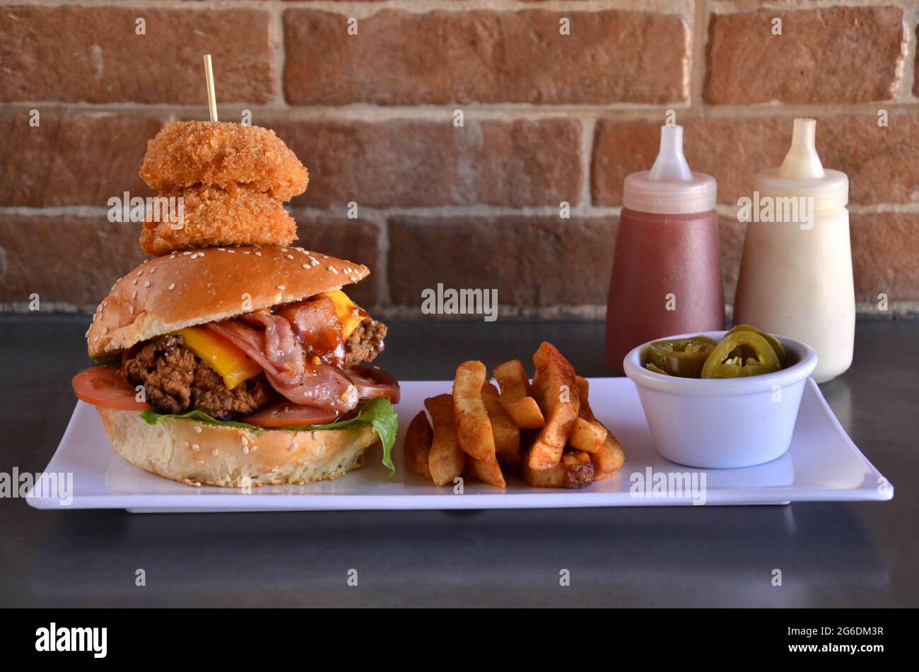 Breaded Chicken Burger With Bacon Stock Photo - Alamy