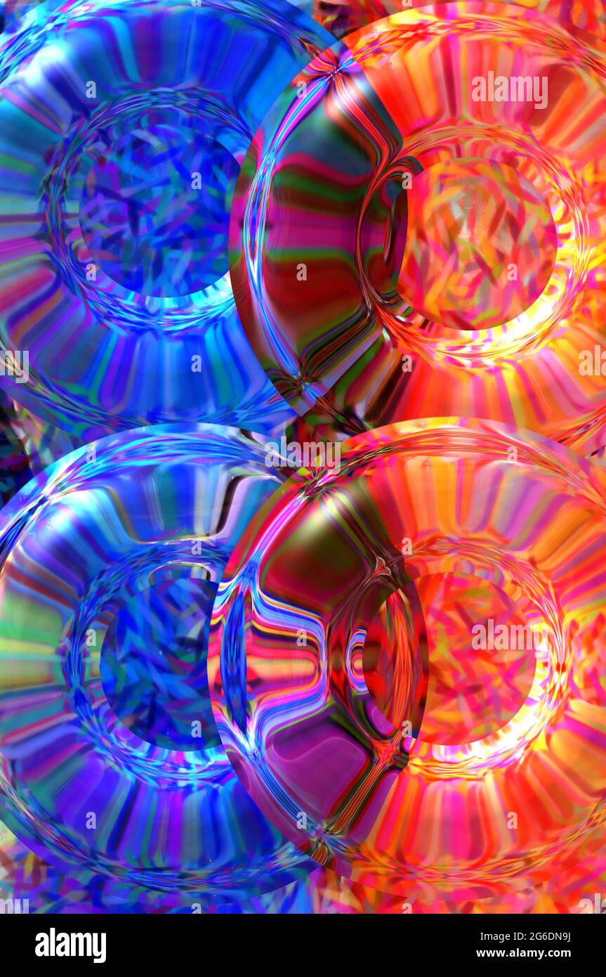 Rainbow ridges cover sugar discs in blue, orange, pink and purple. Pure