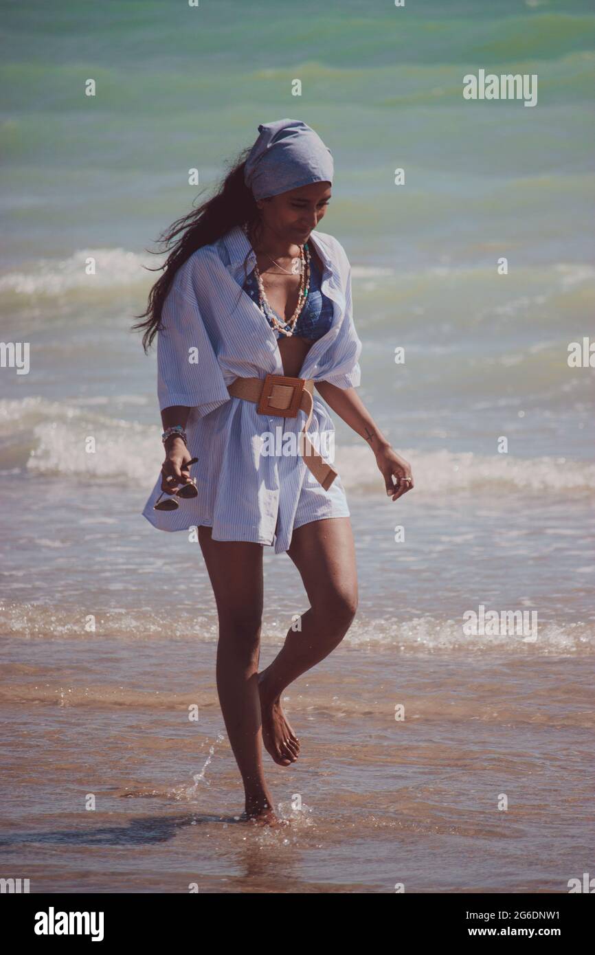 Indian woman walking hi-res stock photography and images - Alamy