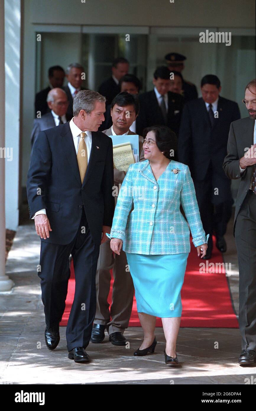 President George W. Bush  and President Megawati Sukarnoputri of Indonesia walk along the Colonnade Wednesday, Sept. 19, 2001, at the White House.  Photo by Paul Morse, Courtesy of the George W. Bush Presidential Library Stock Photo