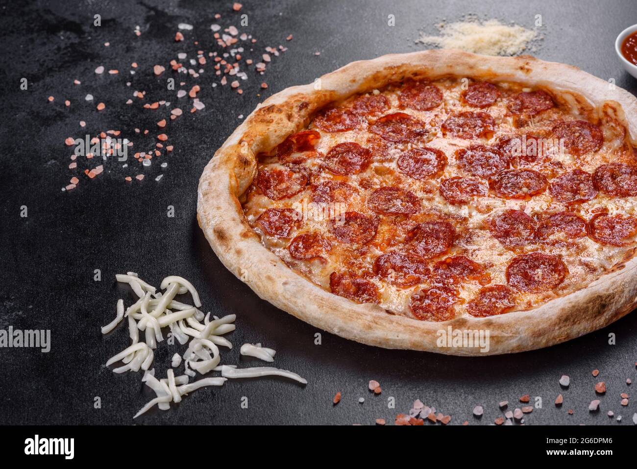 Pepperoni pizza with pizza sauce, mozzarella cheese and pepperoni