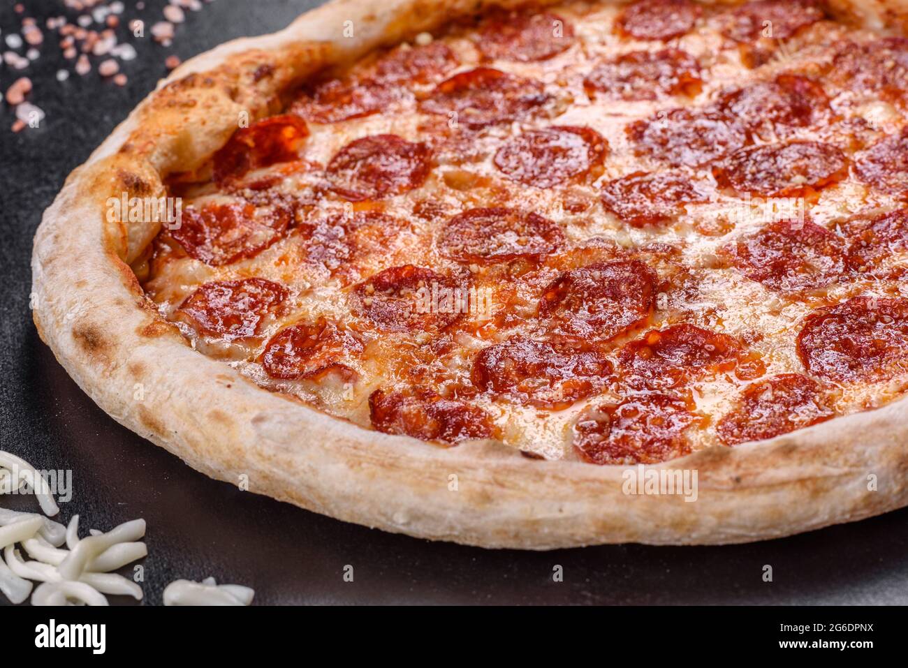Pepperoni pizza with pizza sauce, mozzarella cheese and pepperoni