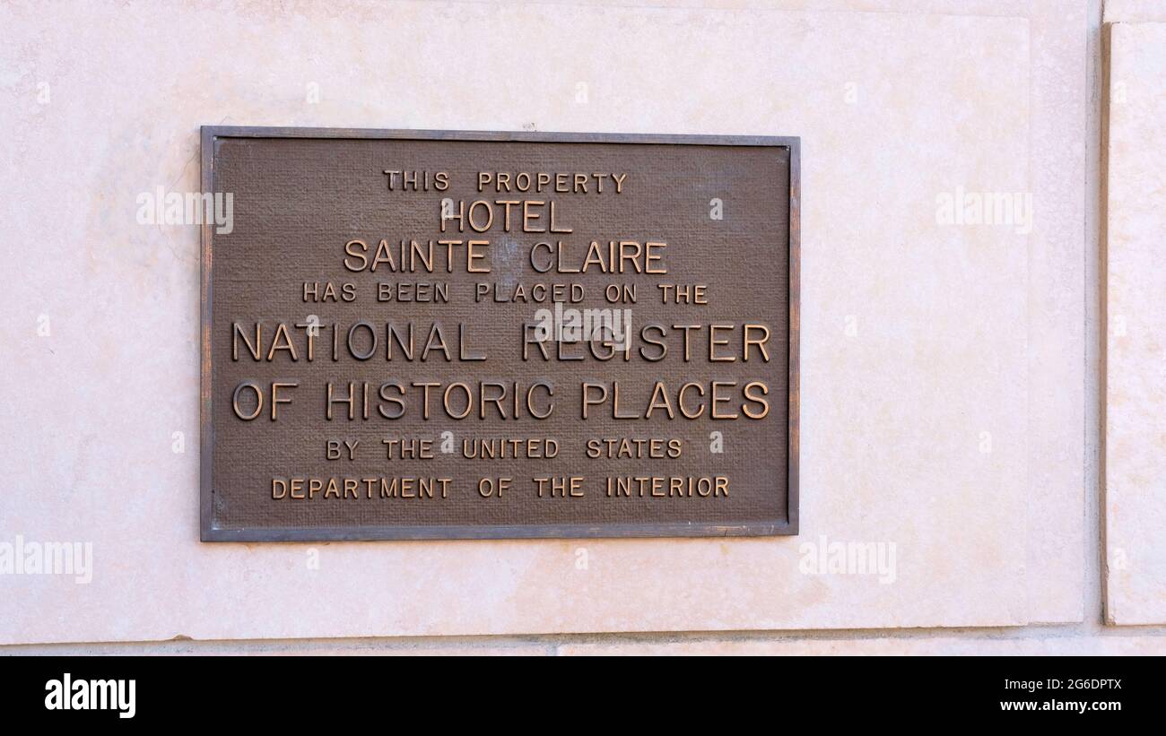 Plaque outside The Westin San Jose with the building's history, formerly the historic Sainte Claire Hotel built in 1926; downtown San Jose, California Stock Photo