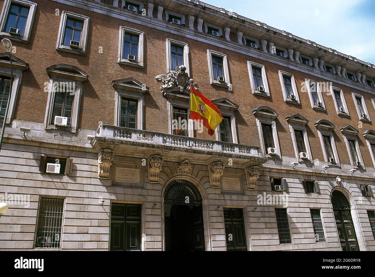 Spain, Madrid. Ministry of Finance (Real Casa de la Aduana). Partial view of the main facade of the building, the former Real Casa de la Aduana, built by Francisco Sabatini between 1761 and 1769 by order of King Charles III. Stock Photo