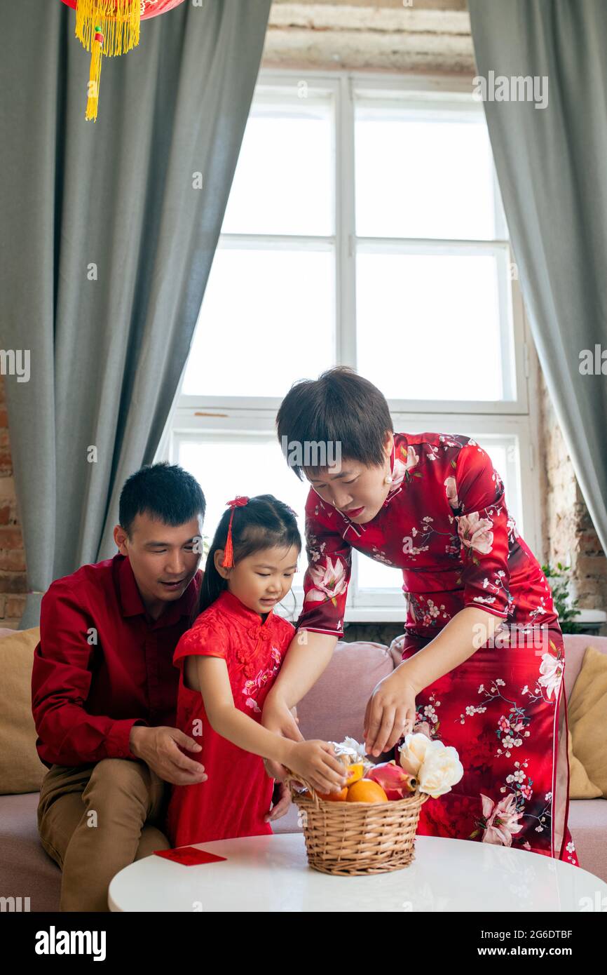 Chinese people preparing snack for picnic in home environment Stock Photo Alamy
