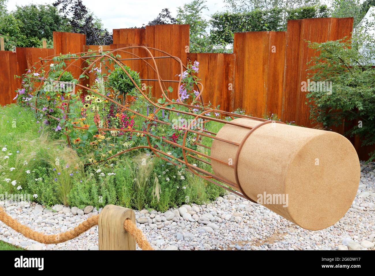 Canal & River Trust 'Message in a Bottle' Global Impact Garden, Silver Medal, RHS Hampton Court Palace Garden Festival 2021, 5 July 2021, London, UK Stock Photo
