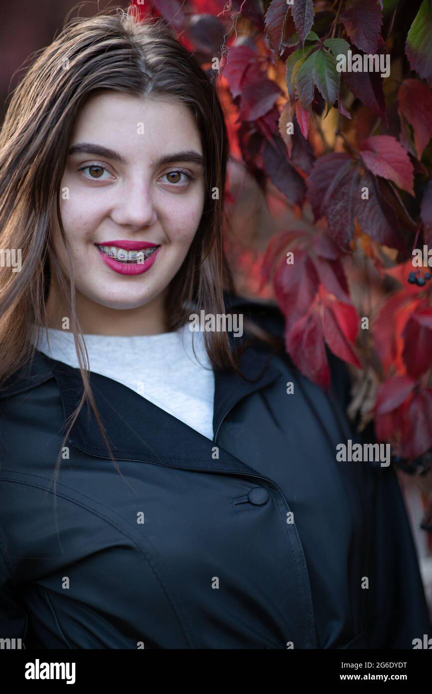 portrait of a beautiful girl close-up in the autumn garden Stock Photo ...