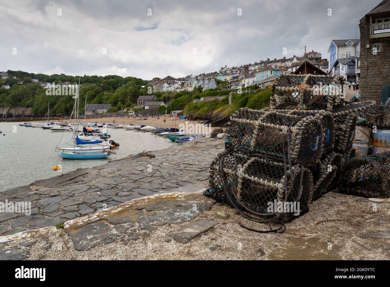 Editorial New Quay, UK - June 27, 2021:  New Quay fishing village on the West Wales coast in the UK, now a magnet for holiday makers. Stock Photo