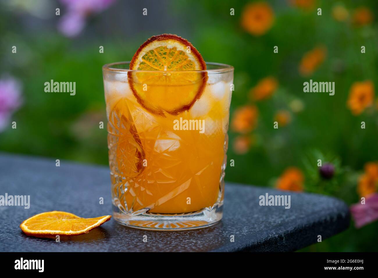 Orange juice and vodka cocktail with ice Stock Photo Alamy