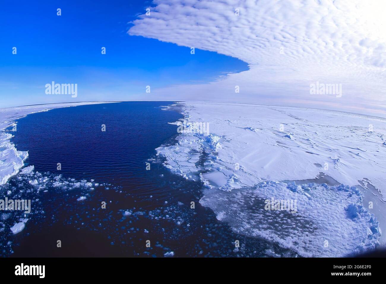 Aerial view over the Ice Shelf and the Antarctic Ocean, Queen Maud Land Coast, Weddell Sea, Antarctica Stock Photo