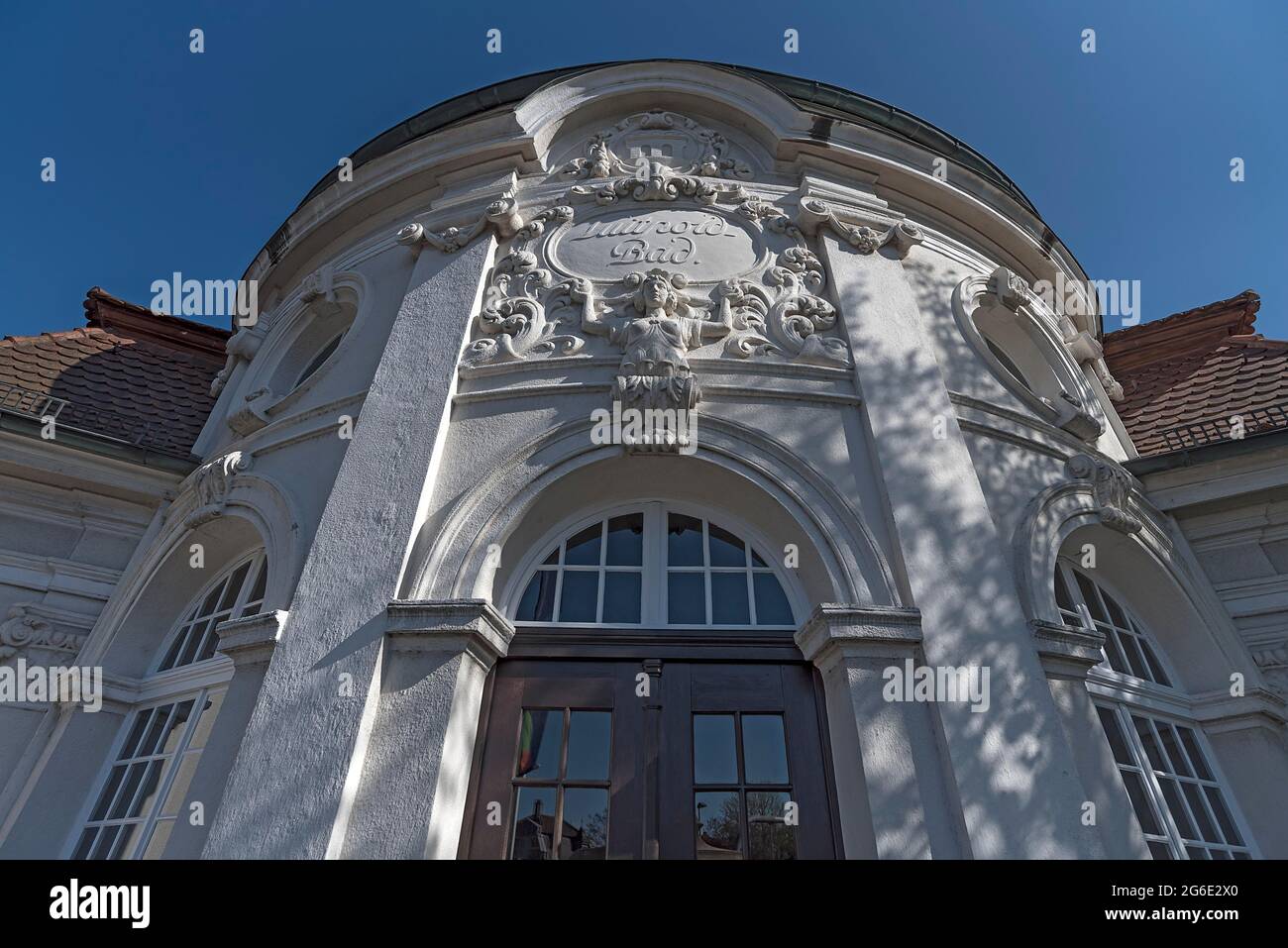 Dome building with entrance portal of the former Luitpoldbad, built in 1914, today the Luitpoldbau Cultural Center, Kitzingen, Lower Franconia Stock Photo