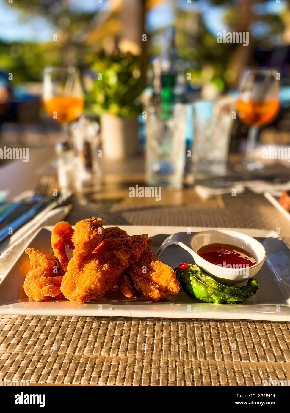 Fried chicken wings with sweet and sour sauce, Port Andratx, Majorca, Spain Stock Photo
