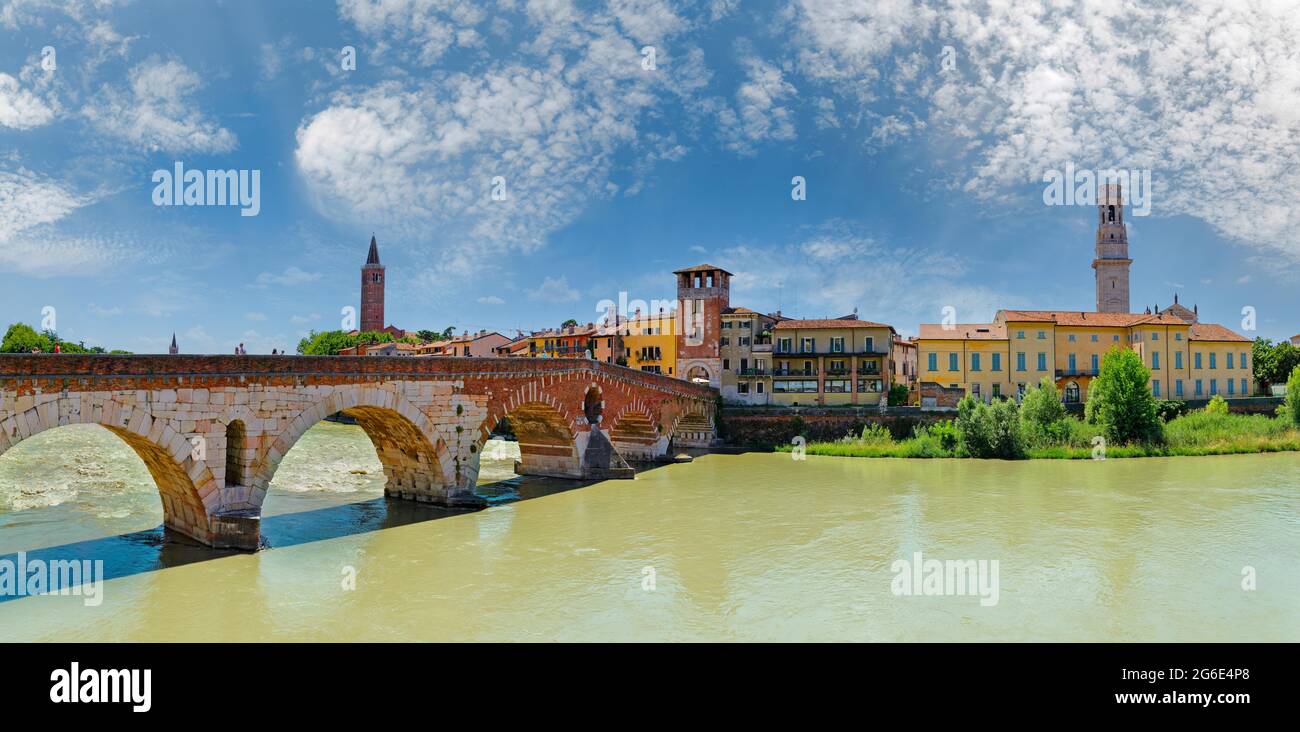 River Adige with city view and the stone bridge Ponte Pietra, Verona, Veneto, Italy Stock Photo