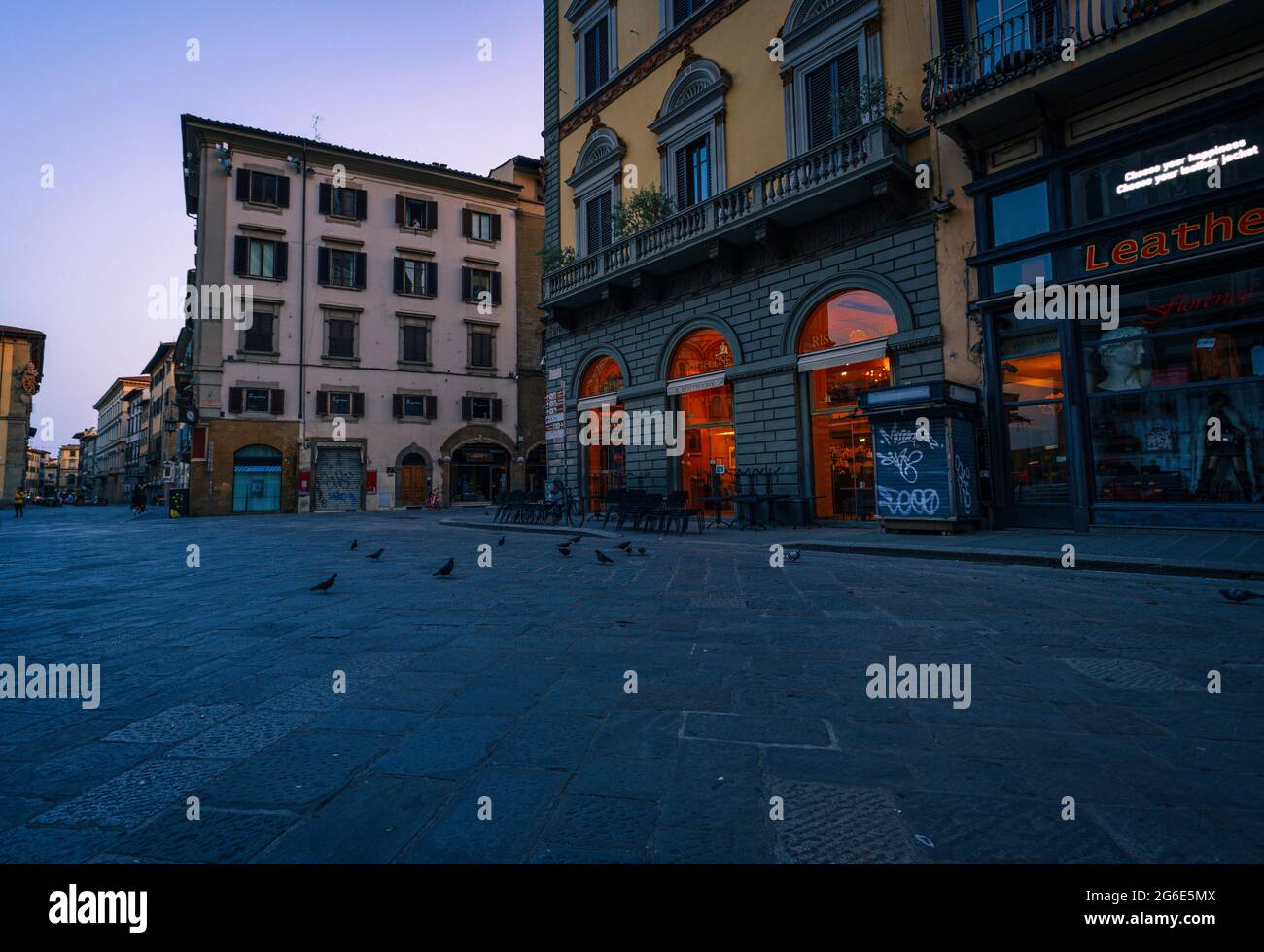 Opening store at piazza della signoria. Dawn in the morning. Blue hour in Florence, Italy. Stock Photo