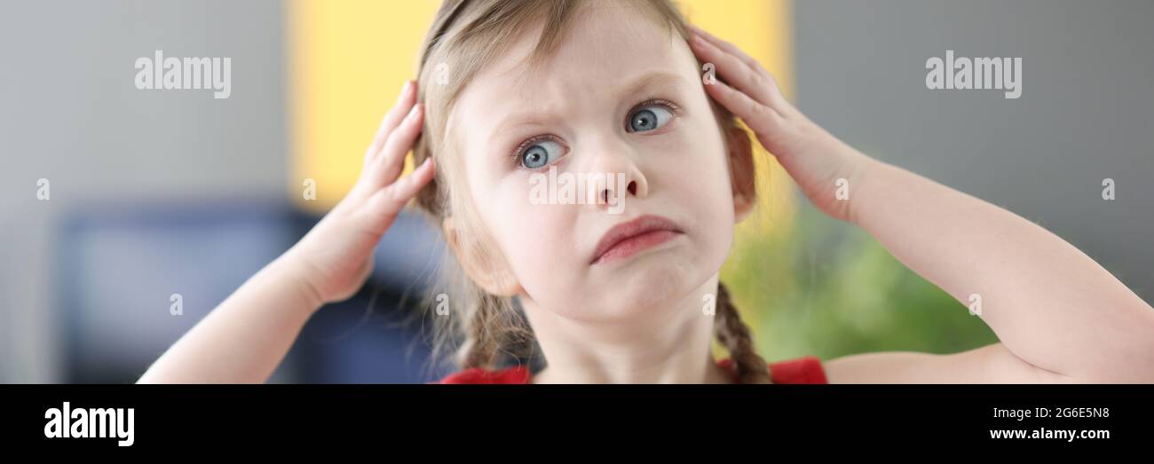 Portrait of surprised little girl with blue eyes Stock Photo - Alamy