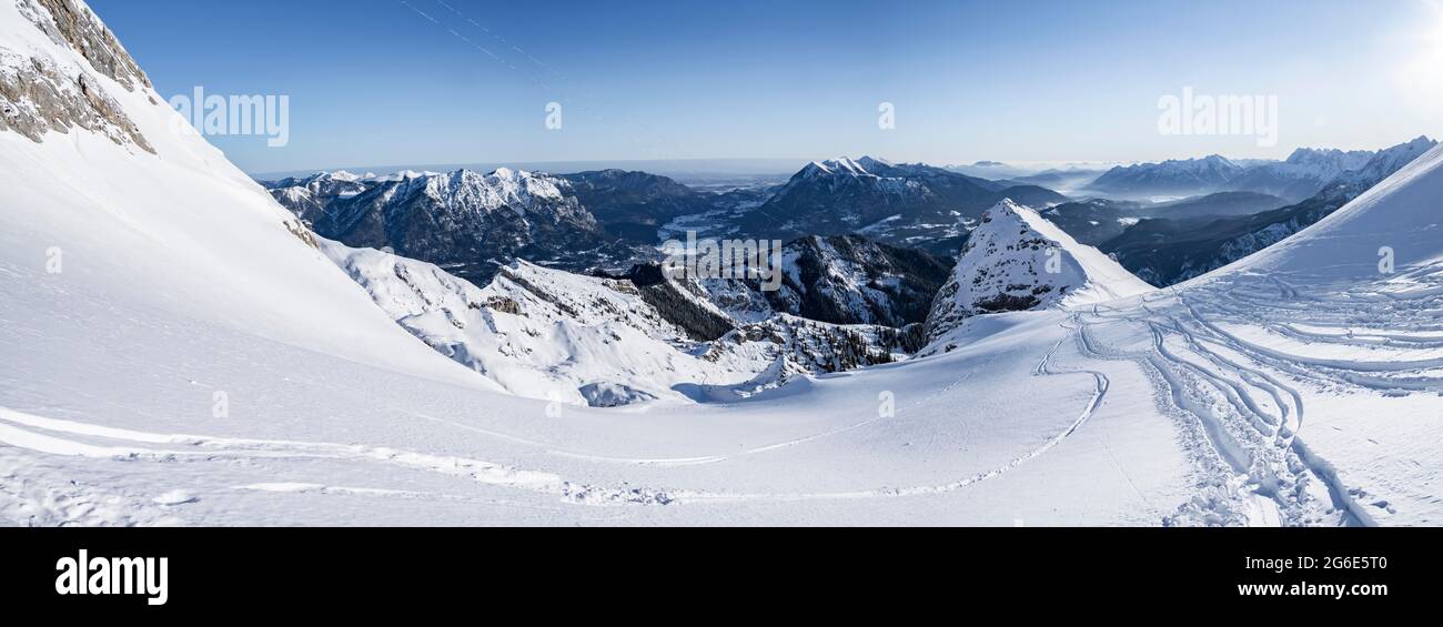 Alpine panorama from the ski tour to the Alpspitze, Bernadeinkopf, view over the Wetterstein mountains with snow in winter, Garmisch-Partenkirchen Stock Photo