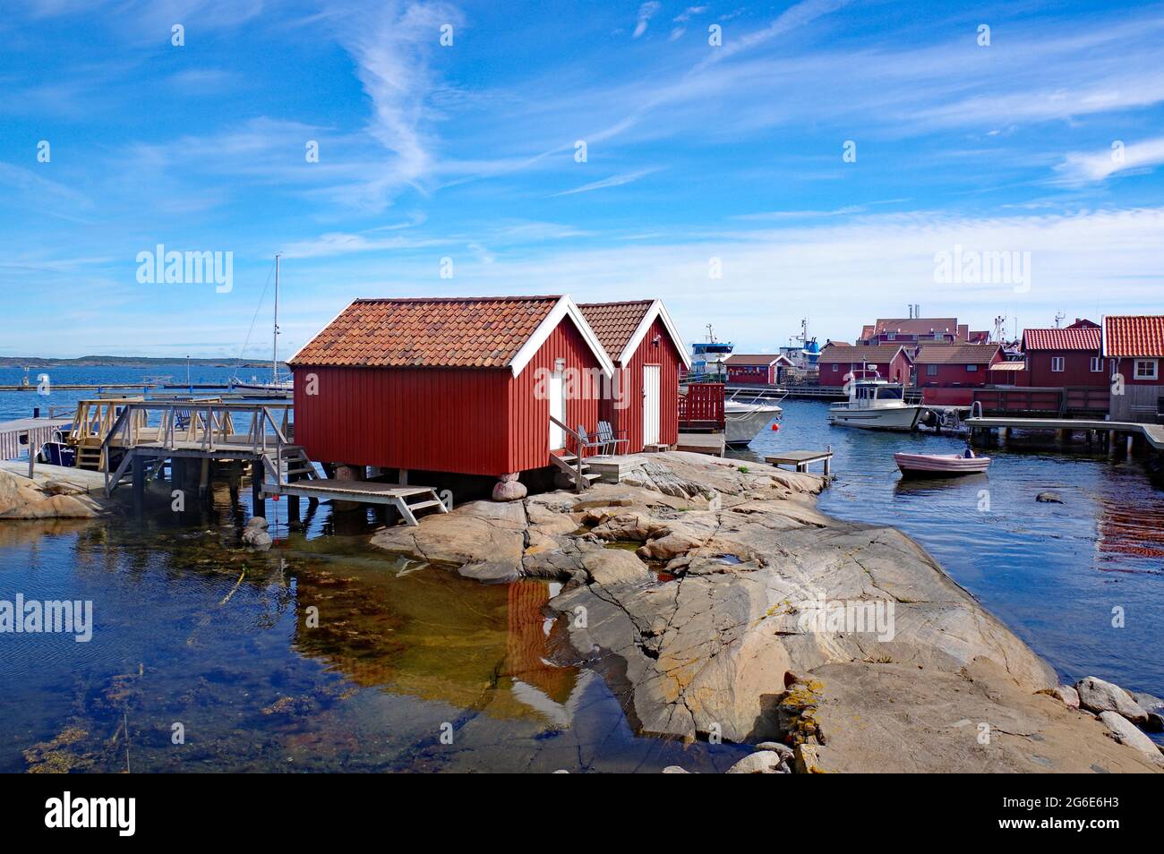 Rocks, boathouses and wooden houses on the archipelago island of Gullholmen, Sweden Stock Photo