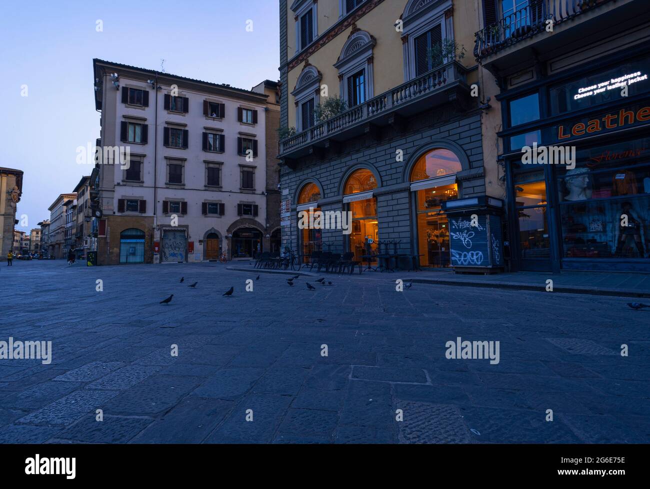 Opening store at piazza della signoria. Dawn in the morning. Blue hour in Florence, Italy. Stock Photo