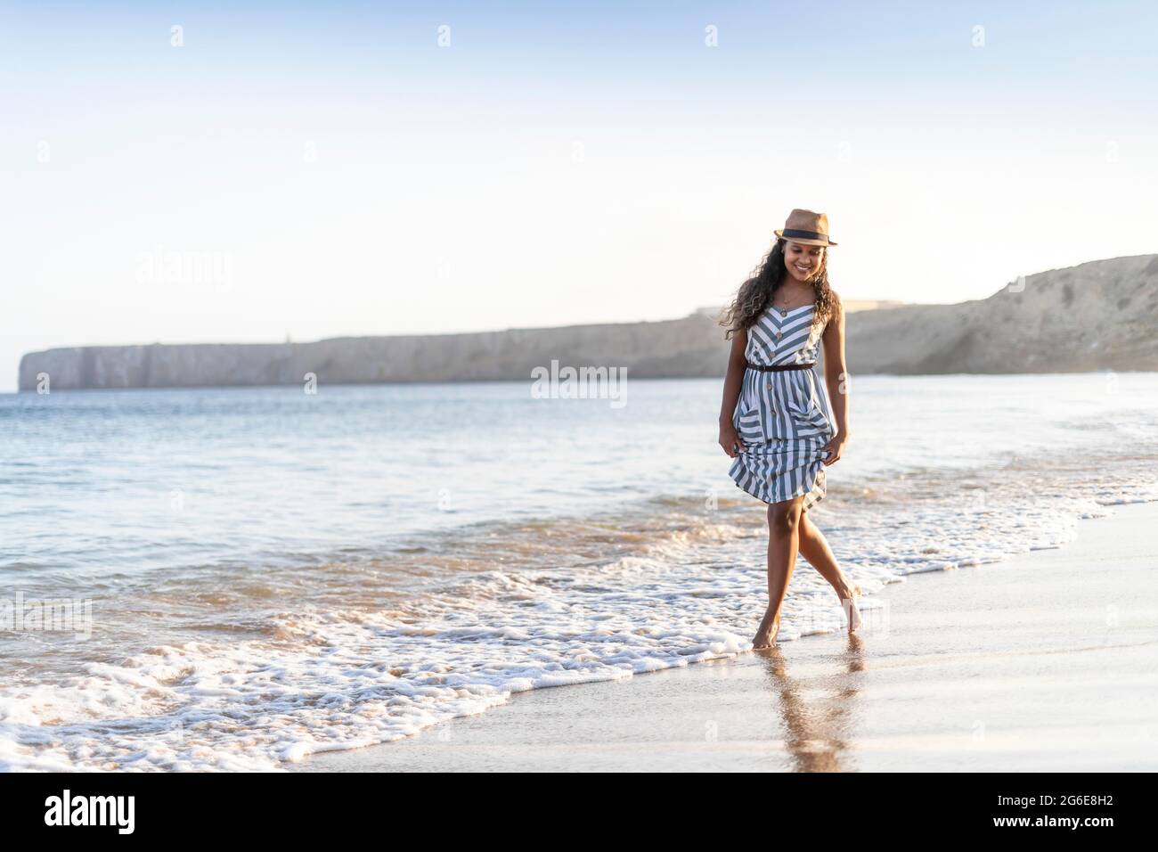 Beautiful female body on beach hi-res stock photography and images - Alamy