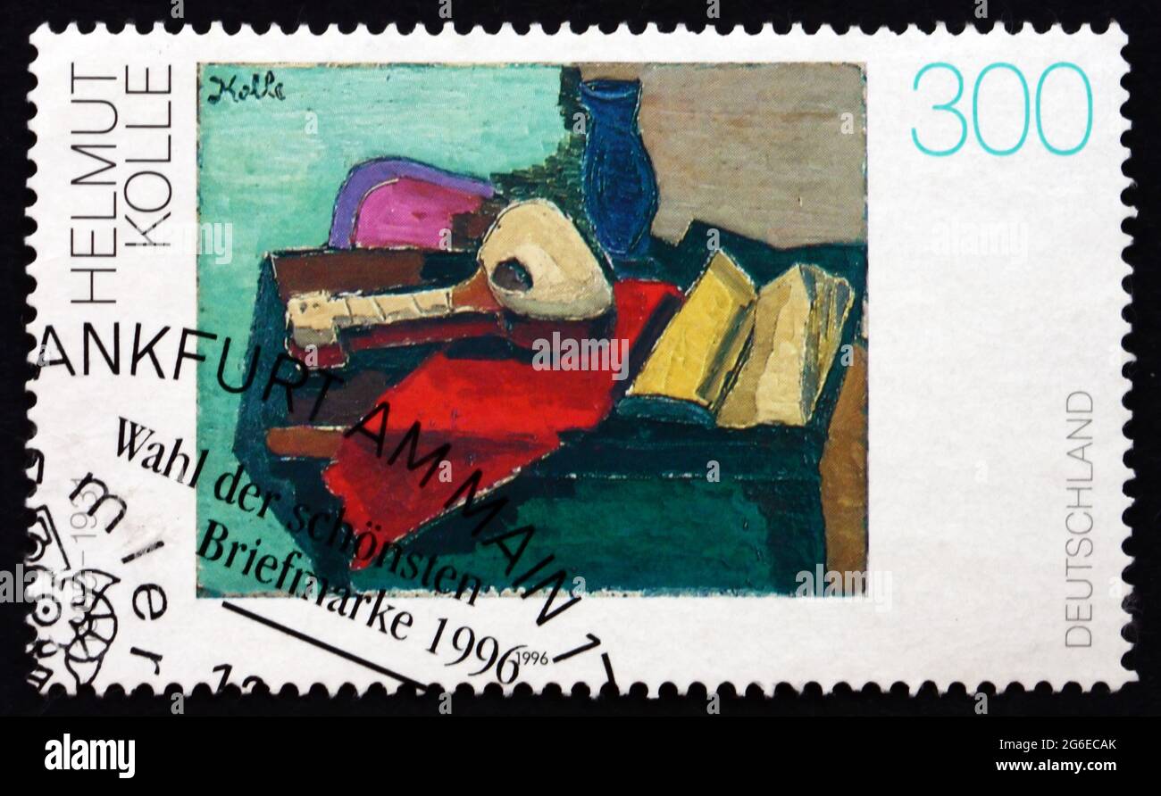 GERMANY - CIRCA 1996: a stamp printed in the Germany shows Still Life with Guitar, Book and Vase, Painting by Helmut Kolle, circa 1996 Stock Photo