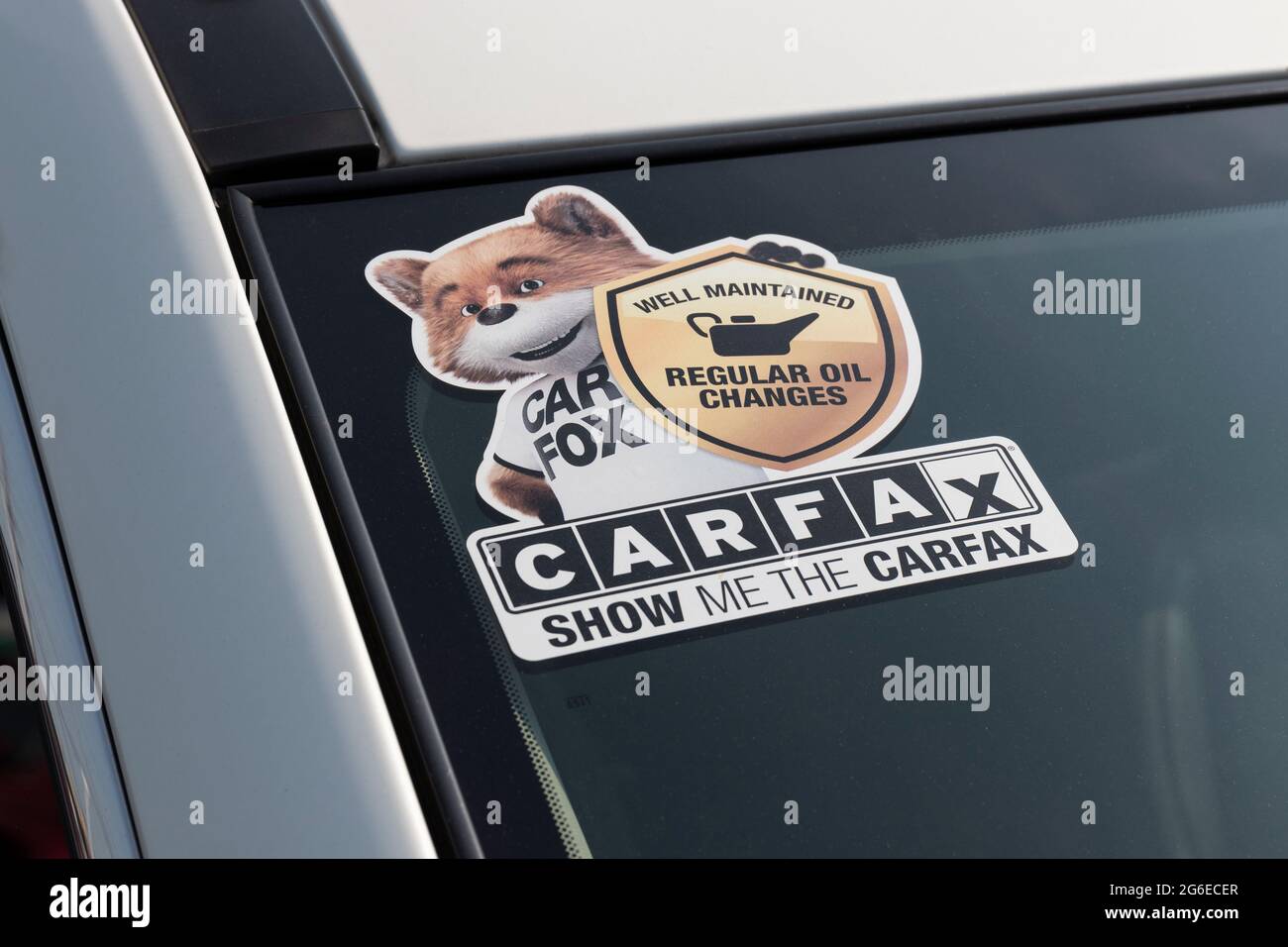 Cincinnati - Circa July 2021: Carfax sticker on a used pre-owned vehicle. Carfax provide vehicle reports for prospective buyers that may reveal proble Stock Photo