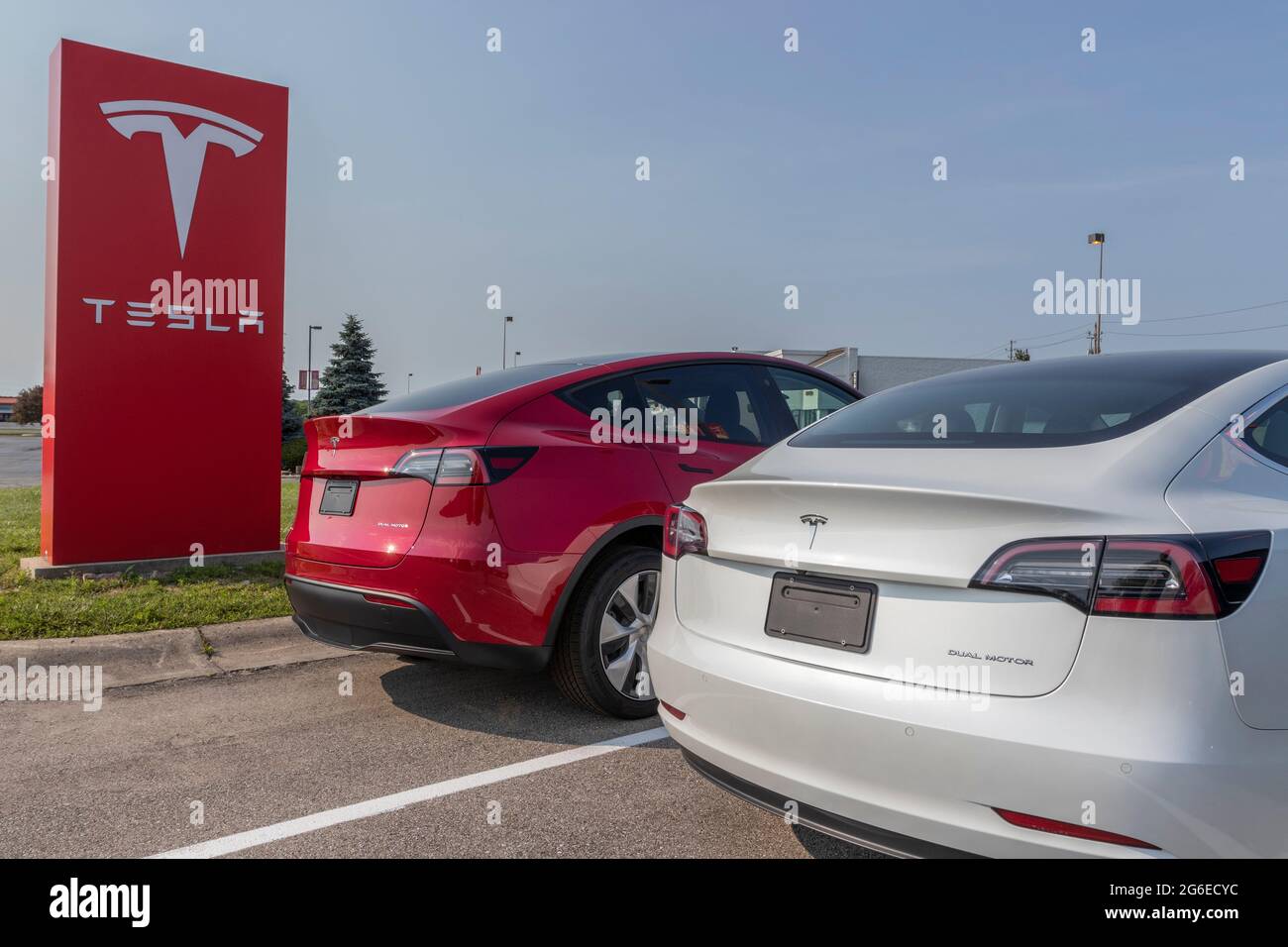 Indianapolis - Circa July 2021: Tesla electric vehicles awaiting preparation for sale. Tesla products include electric cars, battery energy storage an Stock Photo